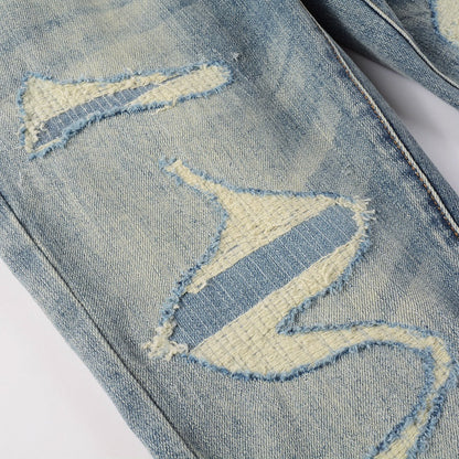 Tear Patch Jeans